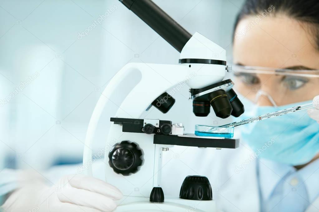 Medical Analysis. Female Scientist Doing Test In Laboratory