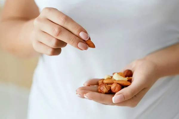 Close Up Of Nuts In Woman Hands. — Stock Photo, Image