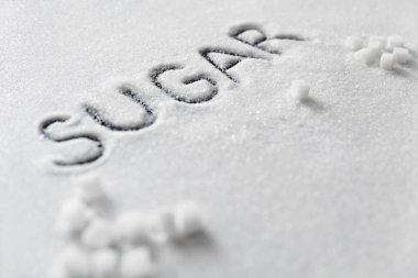 Şeker Word. Arka plan üzerinde beyaz şeker