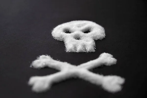 Sugar Poison. White Sugar In Form Of Skull And Crossbones. — Stock Photo, Image