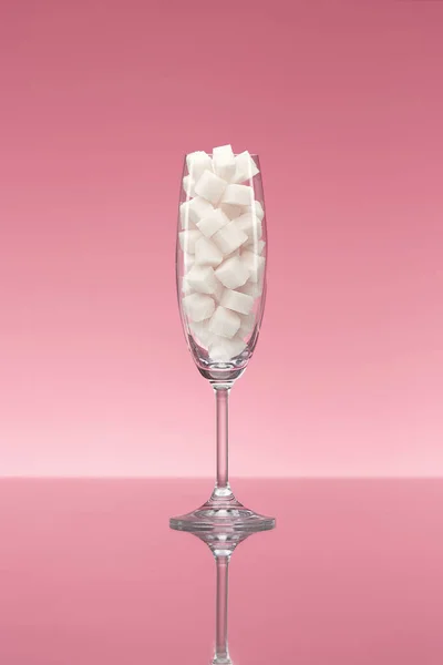 Sugar In Drinks. Glass Full Of White Sugar Cubes.