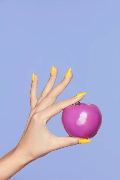 Nails Design. Female Hands With Colorful Nails Holding Apple