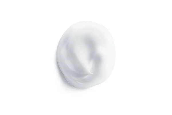 Текстури білого крему ізольовані на білому тлі — стокове фото
