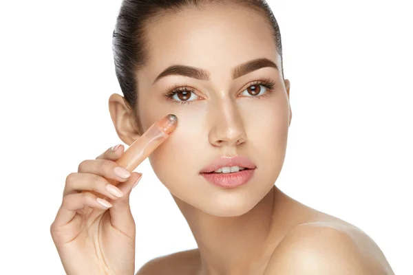 Eye Skin Care. Beautiful Woman Using Cream — Stock Photo, Image