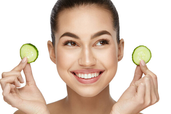 Beauty Face. Skin Care Treatment With Cucumber.