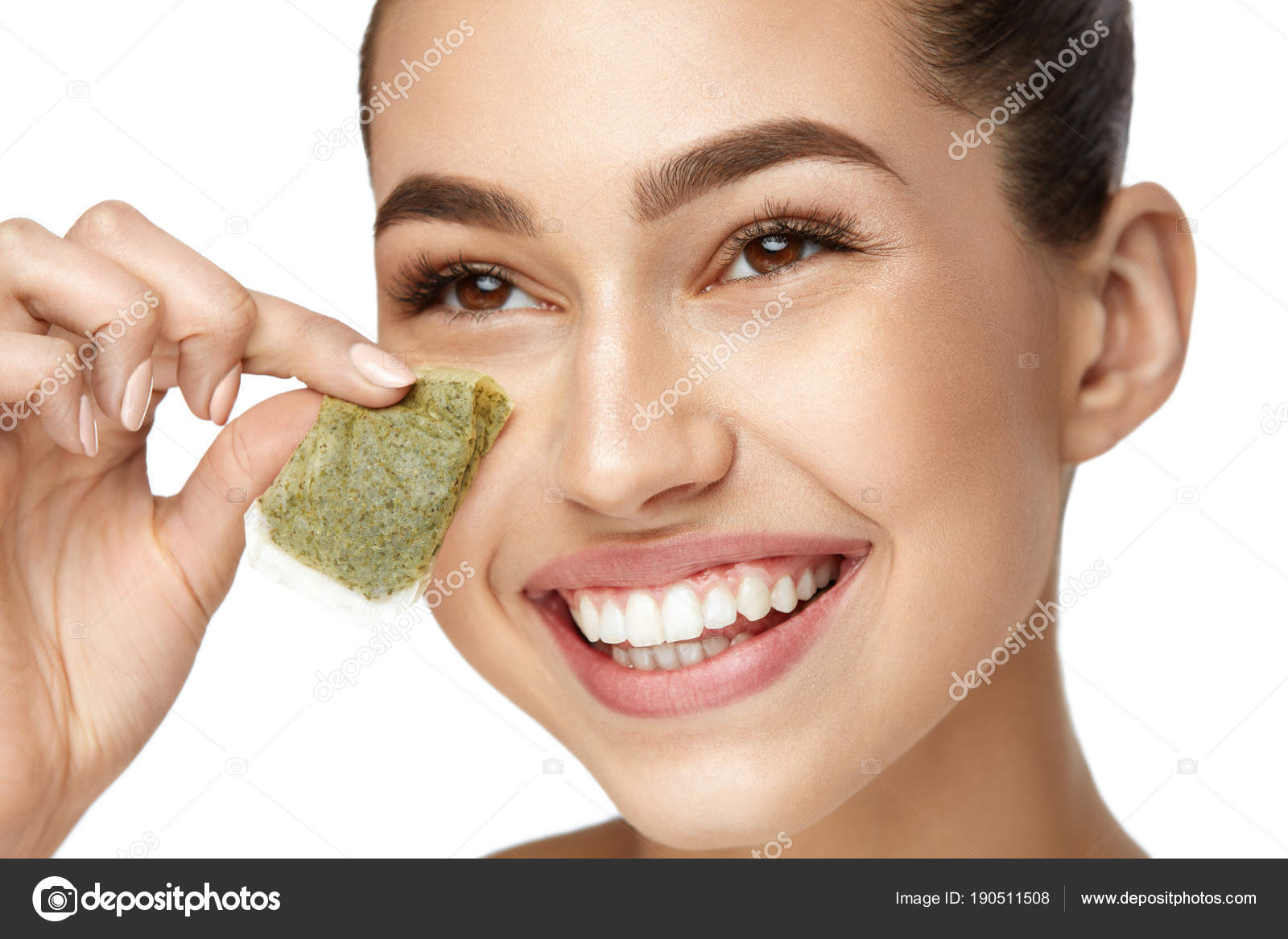 Tea Bag Under Eye. Beautiful Woman With Fresh Healthy Skin Stock Photo