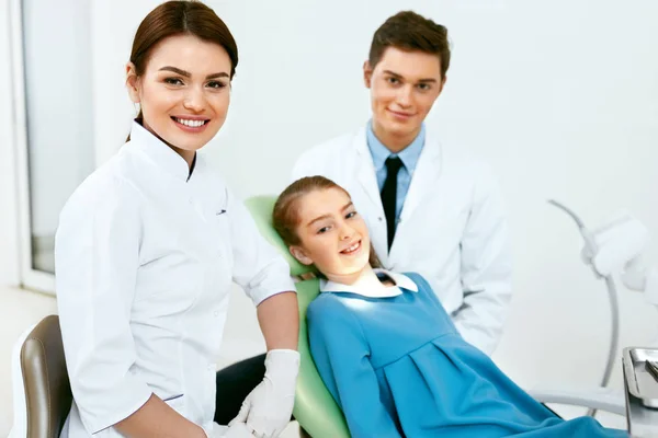Stomatology. Dentistry Doctors And Patient In Dentist Office — Stock Photo, Image