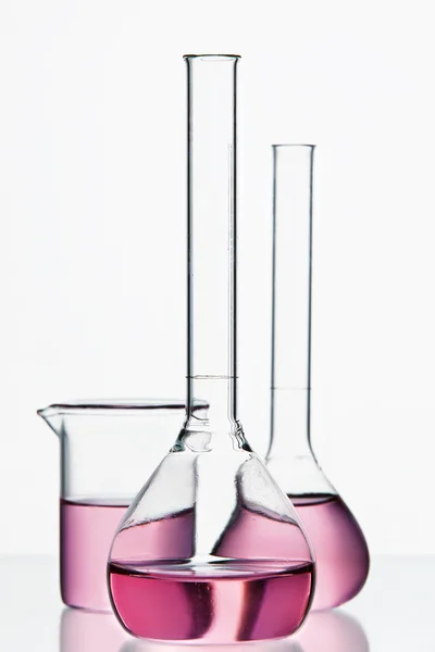 Laboratory Supplies. Glassware With Colorful Chemical Liquid