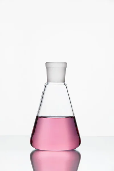 Laboratory Glassware. Glass With Pink Liquid On White Background — Stock Photo, Image