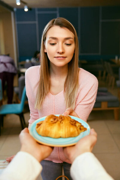 Beautiful Woman Holding Plate With Croissant