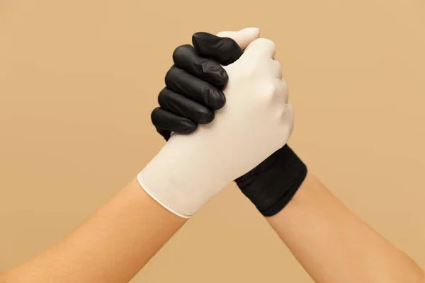 Greeting Friends Hands Gloves Beige Background Personal Protection Virus Prevention — Stock Photo, Image