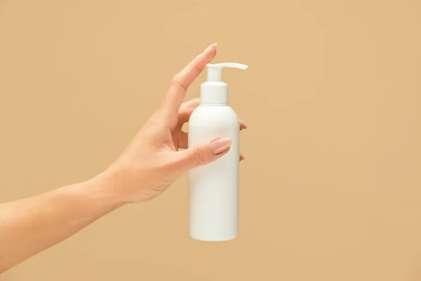 Personal Hygiene Female Hand Holding Gel Sanitizer Bottle Beige Background — Stock Photo, Image