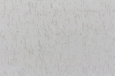 Yumuşak ışık altında soyut doku kabuğu böceği ile Alçı duvar