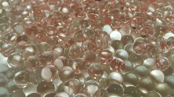 Closeup view with selective focus of shiny glittering orbeez — Stock Photo, Image
