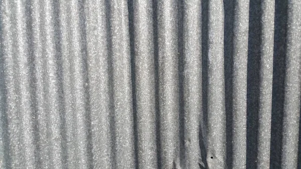 Ασημένια Κυματοειδές μεταλλικό φύλλο υφή φόντου — Φωτογραφία Αρχείου