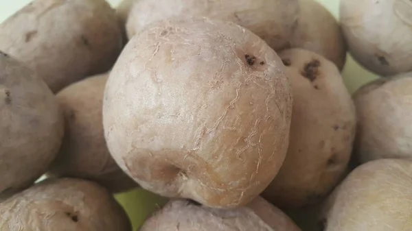Primer plano vista de la papa orgánica fresca en el mercado: patatas textura de fondo — Foto de Stock