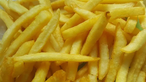 Closeup view of potato french fries or roasted slices — Stock Photo, Image