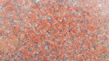 Kırmızı beton zemin dokusuna portre. Arka plan bir kırmızı güneş beton