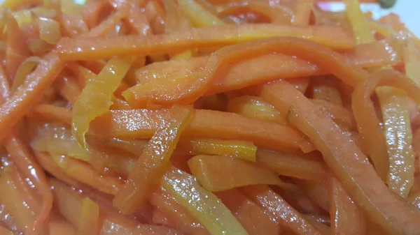 Closeup view with selective focus of boiled carrots. — Stock Photo, Image