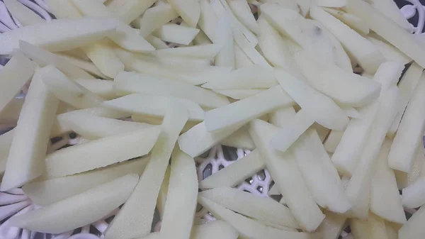 Detailní pohled na Syrové bramborové hranolky nebo bramborové tyčinky — Stock fotografie