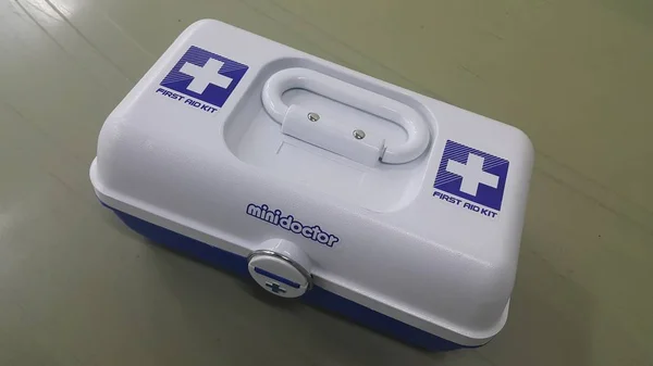 White medical box or first aid kit with plus or cross sign