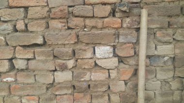 Yıpranmış eski dış duvara güneş altında bir arka plan.