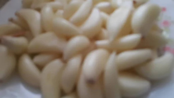 마늘은 향신료와 목적으로 소비하고 사용하기 아로마와 풍미있는 허브입니다 껍질을 배경의 — 스톡 사진