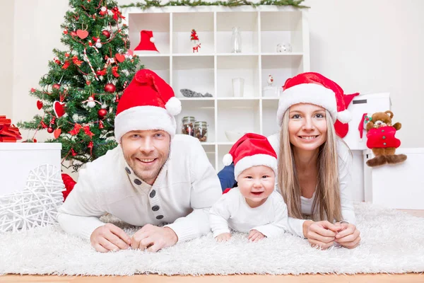Happy family celebrating Christmas at home — Stock Photo, Image
