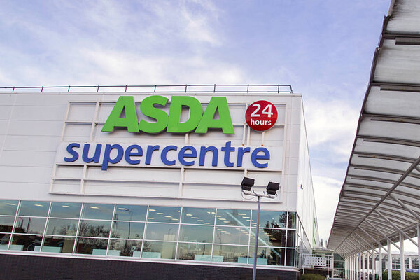 Bristol, UK: Bristol, UK: December 14, 2016: Side view of an Asda Super C 14, 2016: Side view of an Asda Super Centre supermarket. Asda Stores Limited is an American-owned, British-founded supermarket retailer, headquartered in Leeds, West Yorkshire.