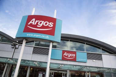 Bristol, UK: December 2016: Argos store front with the website on the commercial sign. Argos is a British catalogue and shop retailer operating in the United Kingdom and a subsidiary of Sainsbury's. clipart