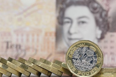 Londra, İngiltere: 03 Ekim 2017: seçici odak ile yeni bir on Lirası Not önünde duran İngiliz bir İngiliz Lirası para. Sahtecilik caydırmak için tasarlanmış yeni İngiliz para birimi 