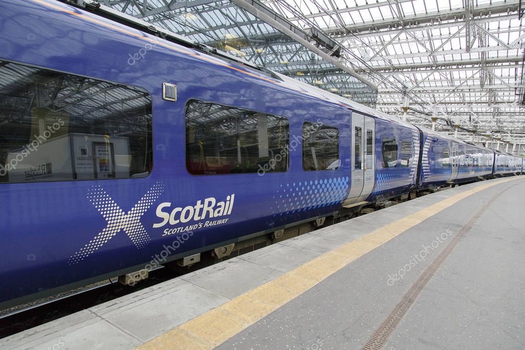 Edinburgh UK: May 26, 2016: ScotRail train waiting at Waverley Railway Station ScotRail refers to a number of Scottish rail corporations that have operated trains in Scotland under the ScotRail brand