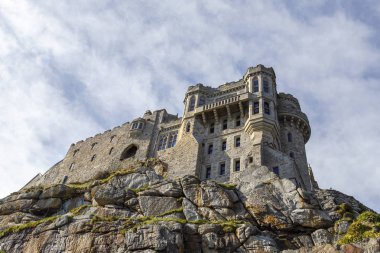 Cornwall, UK: April 12, 2016: The castle on St Michael's Mount. It can only be accessed during low tide by walking over the causeway.