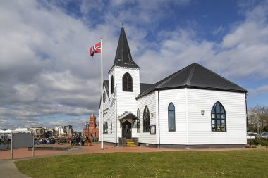 Cardiff, UK: March 10, 2016: The Norwegian Church Arts Centre is a point of cultural and historical interest located in Cardiff Bay. It was a Lutheran Church and attended by Roald Dahl as a child clipart