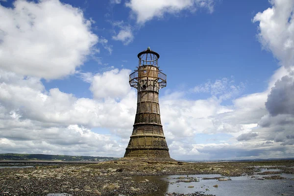 Whiteford Lighthouse is a wave-swept cast-iron lighthouse in British coastal waters and an important work of cast-iron engineering and nineteenth-century architecture.