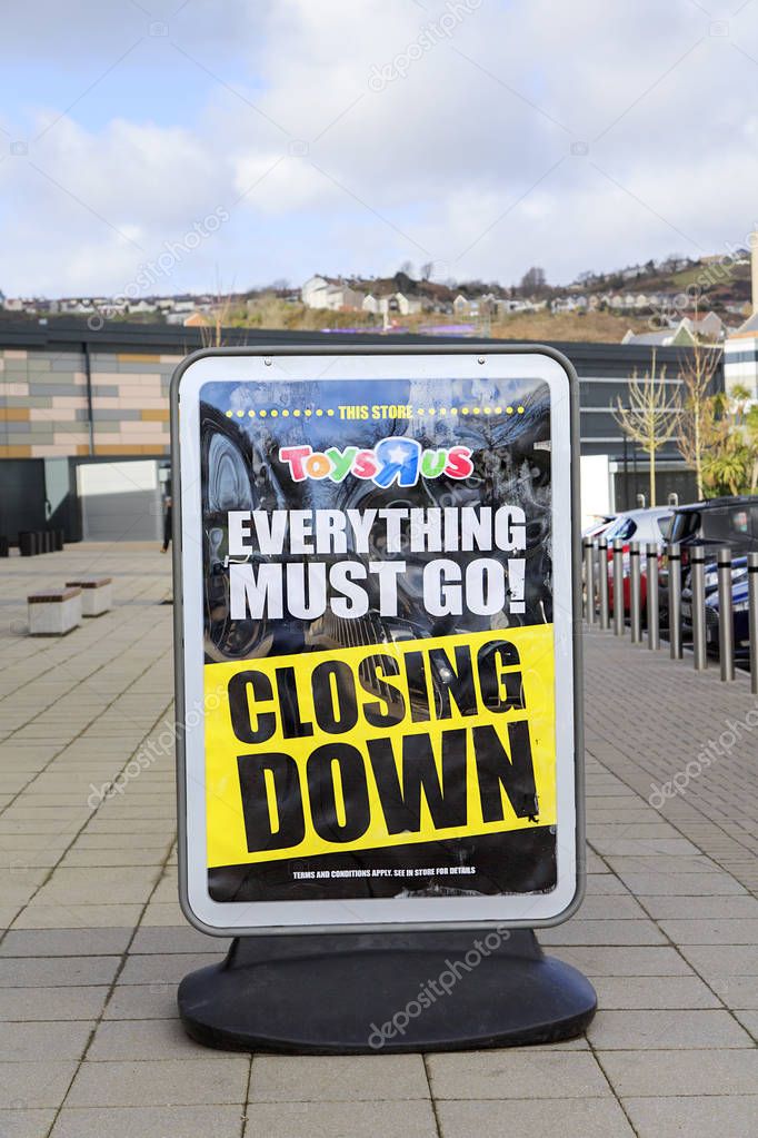 Swansea, UK: March 08, 2018: Sign at a Toys R Us store with closing down and everything must go written on it. Toys R Us Inc. is an American toy retailer headquartered in New Jersey, USA.