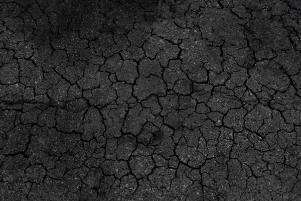 Crack black asphalt. — Stock Photo, Image