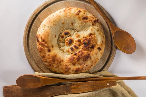 ahşap tahta kaşık ile ev yapımı fırında ekmek Close-Up