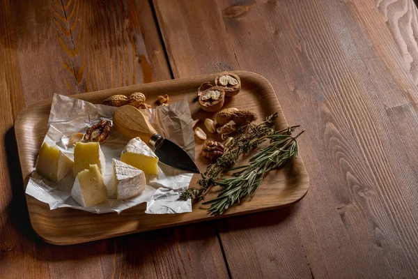Delicious Camembert Cheese Herbs Nuts Knife Wooden Tray Top View — Stock Photo, Image