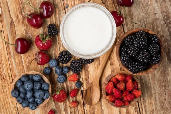 Milk Glass Assortment Fresh Berries Wooden Table Background Top View — Stock Photo, Image