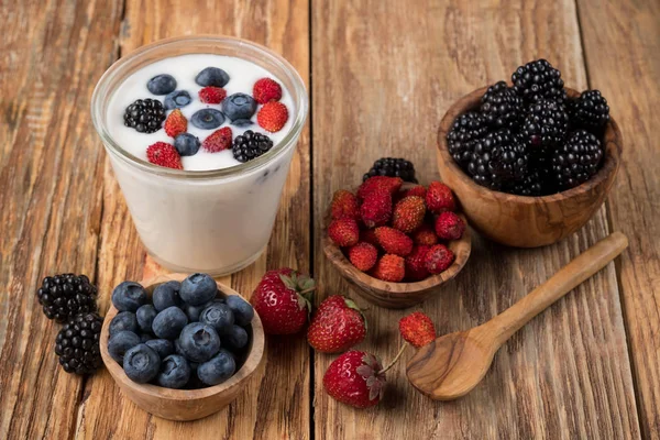 Yogurt Glass Berries Wooden Bowls Spoon Table Close — Stock Photo, Image