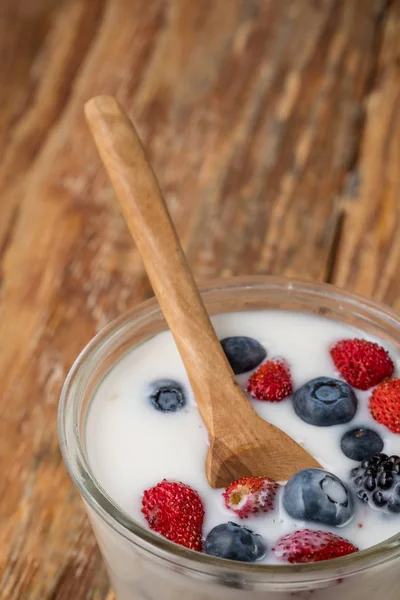 Glass Milkshake Berries Wooden Spoon Wooden Table Top View — Stock Photo, Image