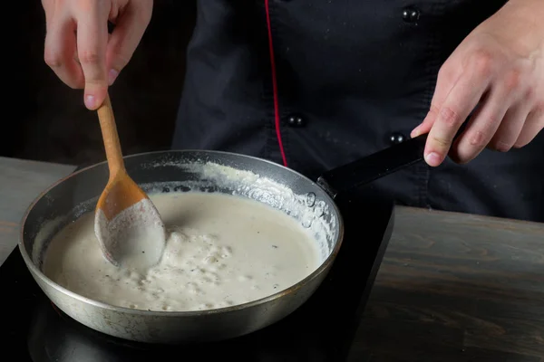 Cooking handmade pasta with Italian ingredients