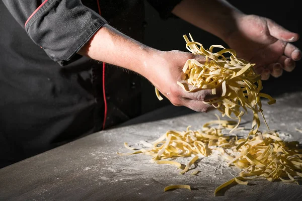 Hands Chef Cooking Pasta Spaghetti Powdering Flour Dark Black Background — Stock Photo, Image