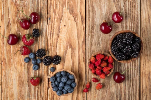 Berries Wooden Bowls Table Top View Copy Space — Stock Photo, Image
