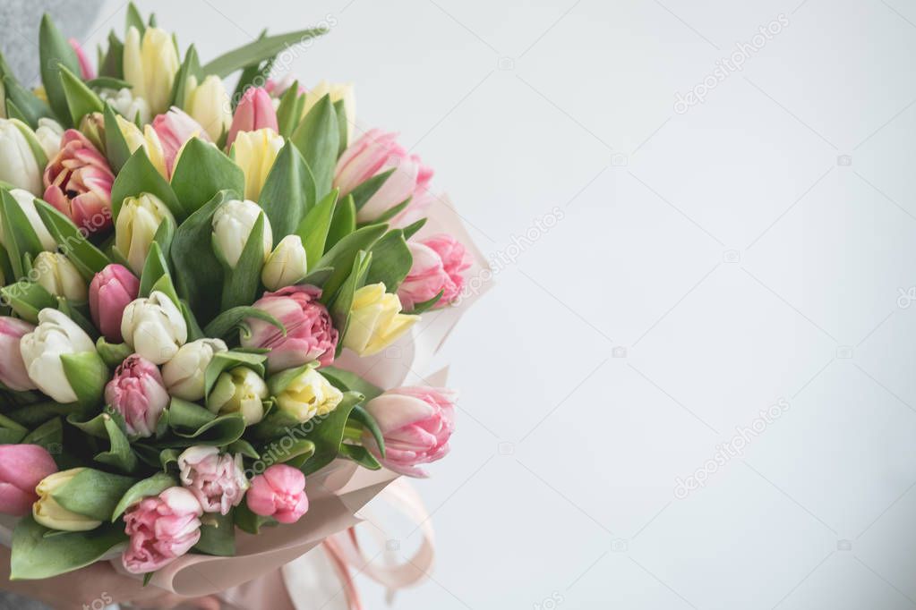 close-up of beautiful bouquet of colored spring tulips flowers 
