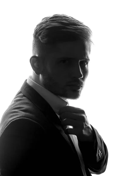 Monochrome Portrait Young Man Suit Holding Collar His Shirt — Stock Photo, Image