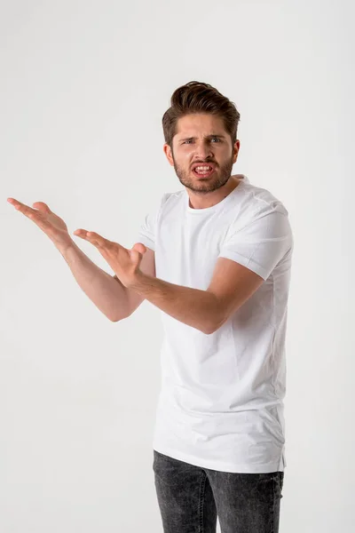 Portrait Young Bearded Disgusted Man Gesture White Shirt Grey Background — Stock Photo, Image