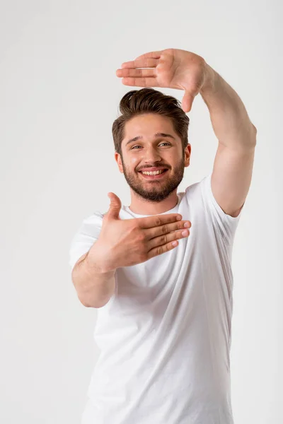 Portrait Happy Young Bearded Man Gesture Frame White Shirt Grey — Stock Photo, Image