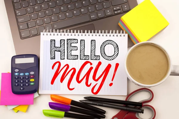 Word writing Hello May. Spring in the office with laptop, marker, pen, stationery, coffee. Business concept for Criminal hacker security prevention Workshop white background with copy space